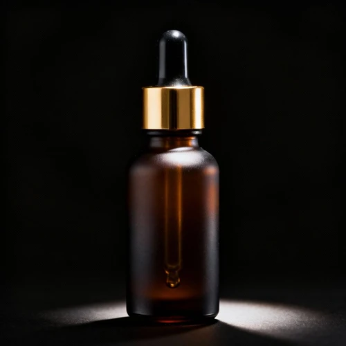 深棕色磨砂玻璃滴管瓶，金色瓶盖，瓶身有光泽感，黑色背景，正视拍摄，边缘光清晰